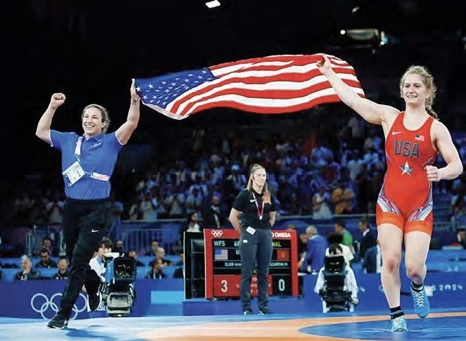 Sara McMann celebrating with Amit Elor after gold medal win at the 2024 Paris Olympics