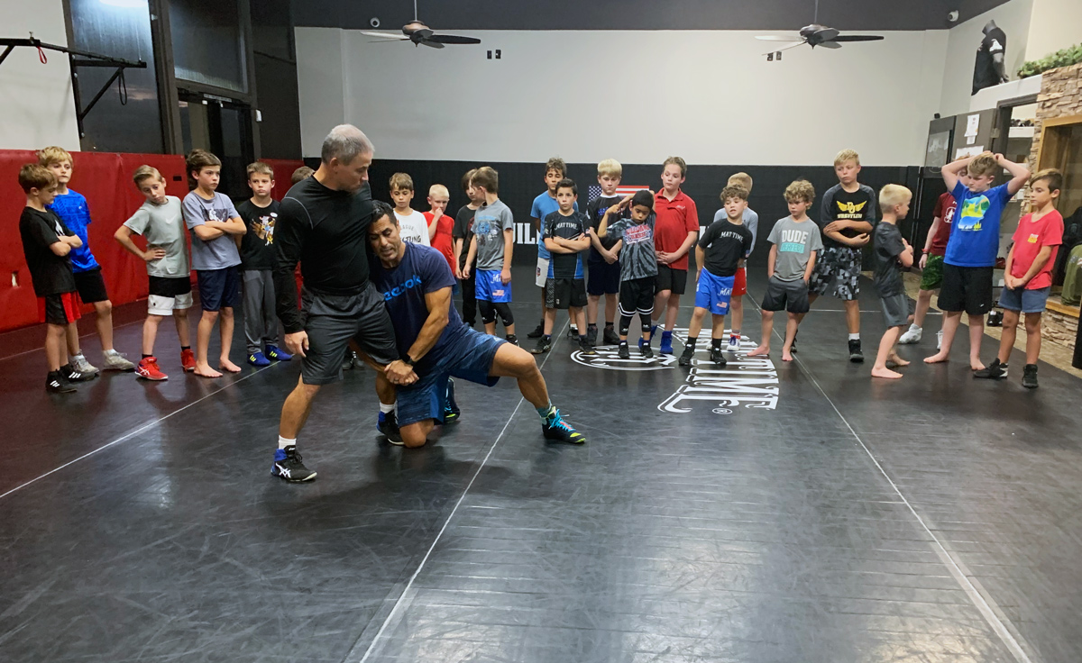 Coach Adrian double-leg takedown